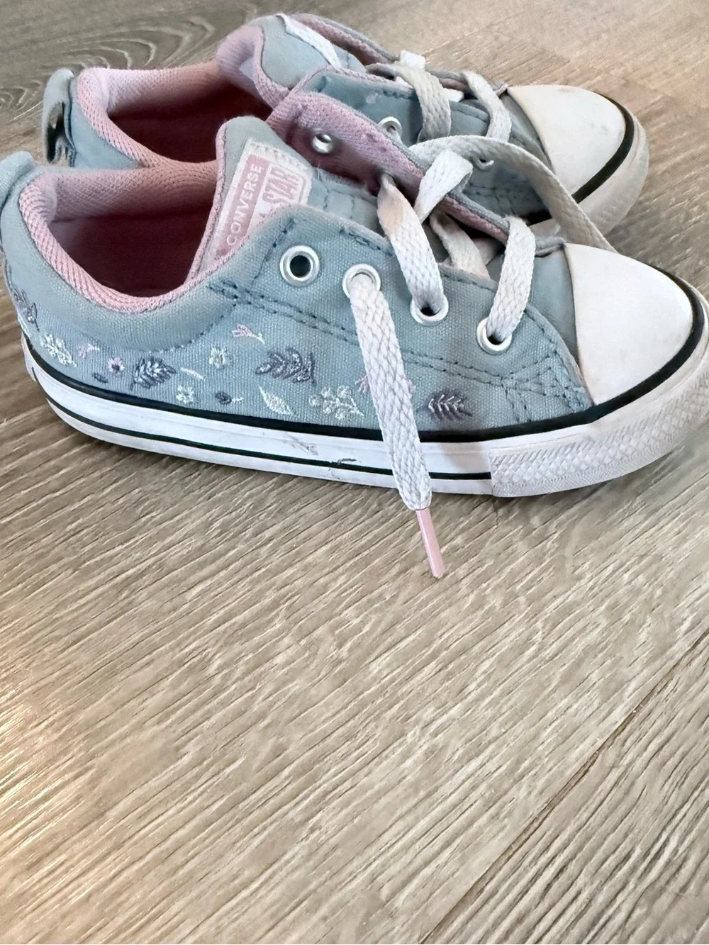 Converse Kids Light Blue and Pink Low Top Sneakers with floral accents